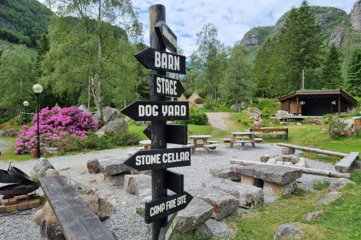 a sign next to a picnic area