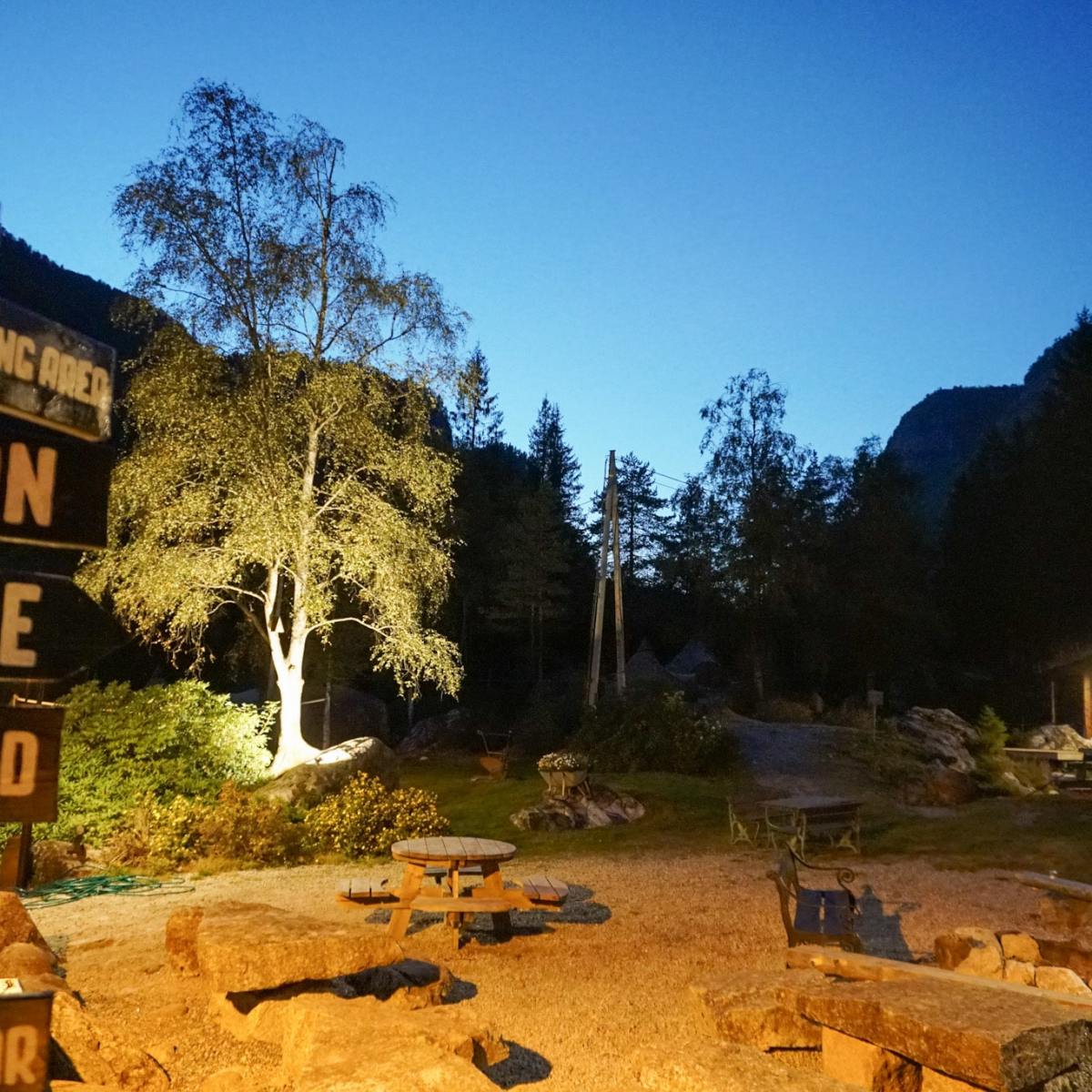 a sign on the side of the street