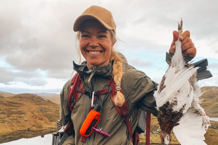 a person holding a dog